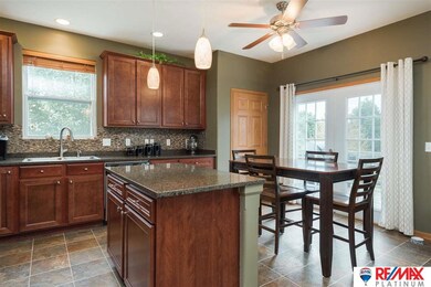Eat in kitchen with patio door footsteps from your private backyard