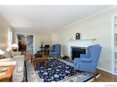 Living Room with fireplace and built-in bookcase