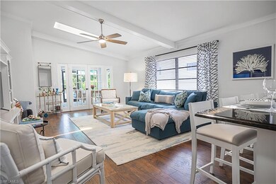 Family Room with Vaulted Ceiling, Skylights and Fr