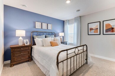 Beautiful primary bedroom upstairs with private bathroom.