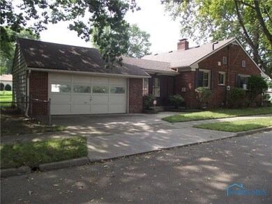 Oversized 2+ car garage attaches to breezeway to h
