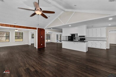 Unfurnished living room with beam ceiling, ceiling