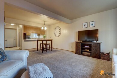 Living room facing kitchen