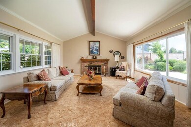 Spacious living room/dining area/flex with views to the backyard and front