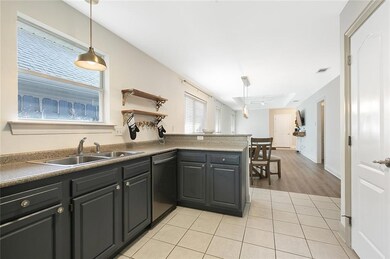 KITCHEN OPEN TO BREAKFAST AND LIVING