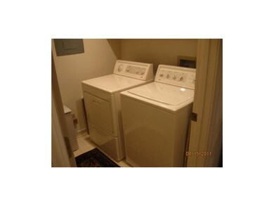FIRST FLOOR LAUNDRY PLUS BASEMENT STORAGE.
