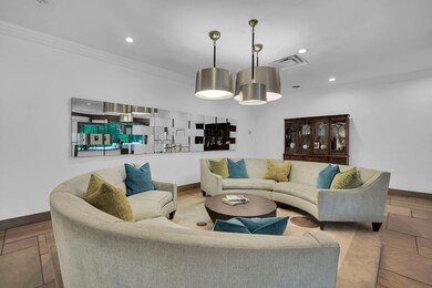 Tiled living room with crown molding