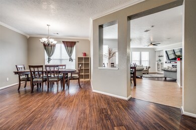 Formal dining and entry to kitchen/ living room