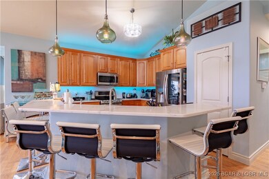 Huge breakfast bar seats an additional 7 people! G