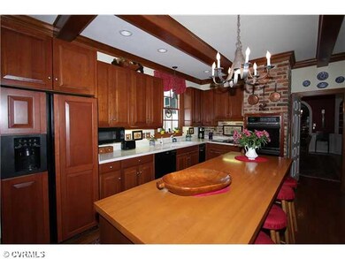 Kitchen - cherry cabinets,butcher block island,wid