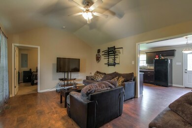 Additional view of the living room that opens up to the kitchen