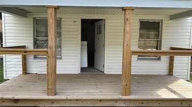 Deck featuring covered porch