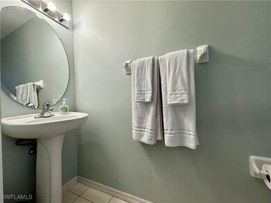 Bathroom with tile patterned floors