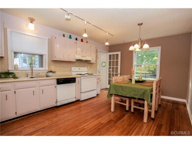 Eat-in Kitchen with new flooring and back splash