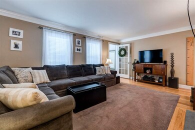 with carpet, hardwood and surround sound