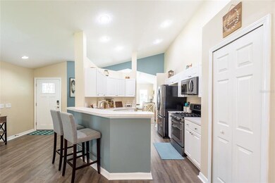 Kitchen with vaulted ceiling. Updated appliances.