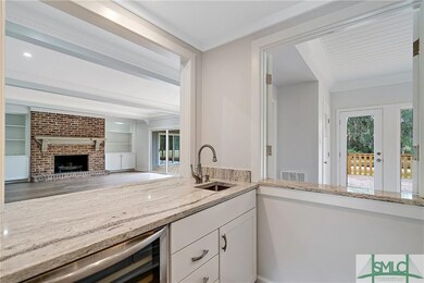 Clever Wet Bar strategically centered between the 