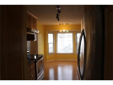 Bay windows in eat-in kitchen area.