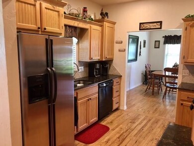 Updated kitchen open to both formal dining