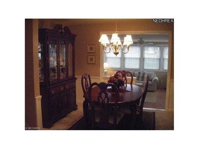 Formal Dining Area looks into Sun Room.