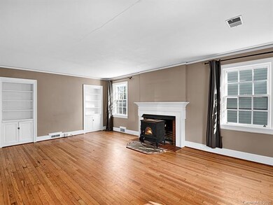 Large living room with wood stove