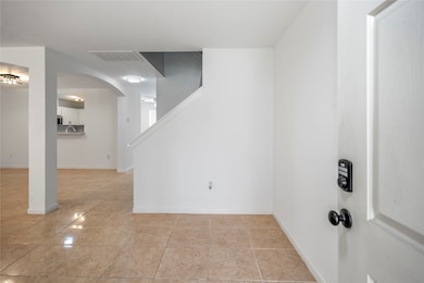 Welcome inside this beautiful space with all tile floors.