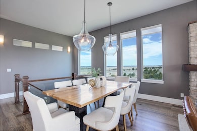 Dining area with hickory floors