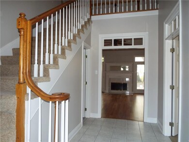 Foyer opens to upstairs.