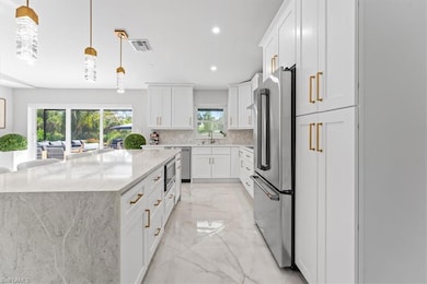 Kitchen featuring appliances with stainless steel 