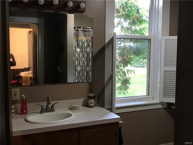 The remodeled bath is located off the kitchen.
