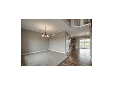 Front foyer is hardwood floors.  Living room locat