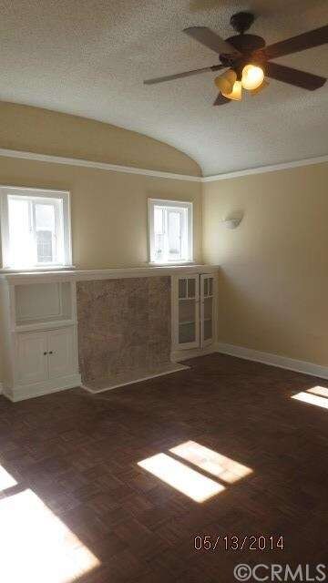 Living room with Classic Built Ins tons of windows