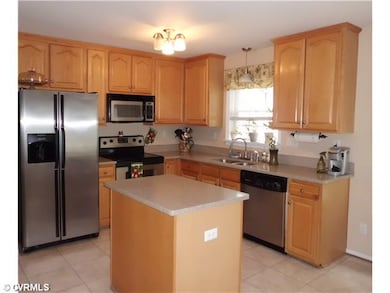 Kitchen - Kitchen with solid surface counter tops,