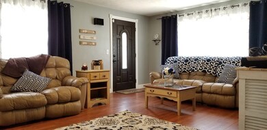 Spacious Living Room w/ original hardwoods