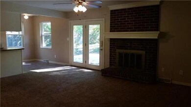 MAIN FAMILY ROOM WITH CUSTOM FIREPLACE MANTLE!