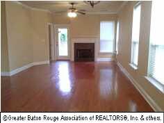 Large living and dining area with lovely Fireplace