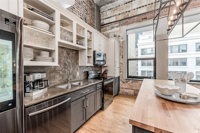 A closer look at the concrete countertops, spaciou