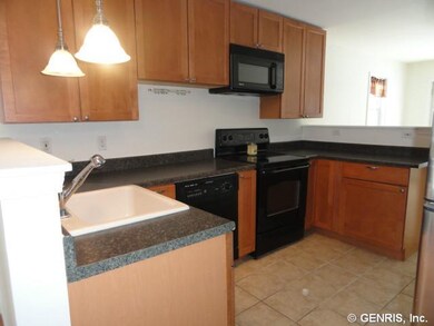 Kitchen. U shaped  kitchen strategically located b