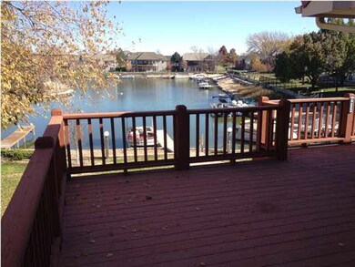 This large deck is perfectly situated for shade, j