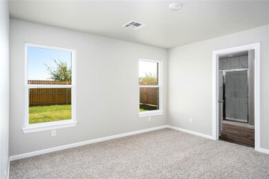 The master retreat features its own walk-in closet