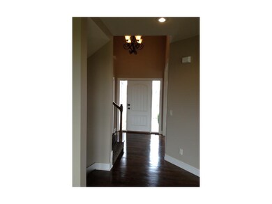 Front entry with oak hardwood floors.
