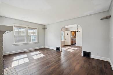 Living room with new LVP flooring & paint