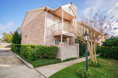 This charming two-story home features a brick exte