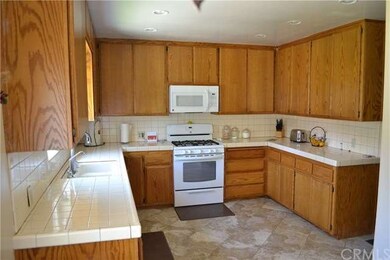 Large kitchen with over the range microwave oven, 