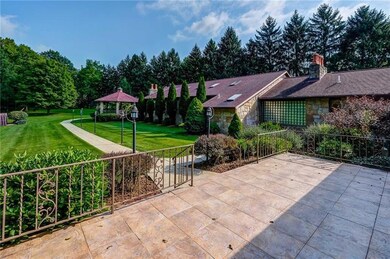 Luxurious grounds w landscape lighting