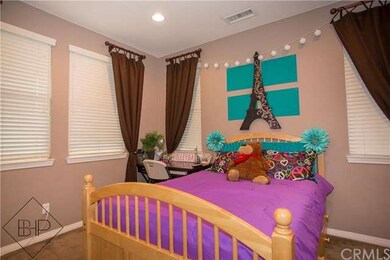 Downstairs den that is being used as a 4th bedroom
