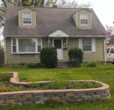 Raised flower bed and large fenced yard