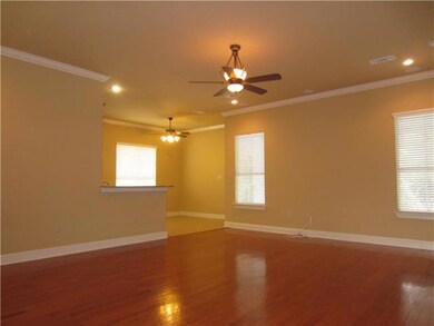 Living Room. Plenty of Open Space Next to the Kitc