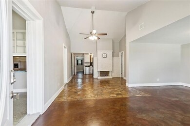 Entry From Front Door Into Living Room & Dining Ar