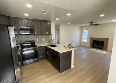 Kitchen with appliances with stainless steel finis